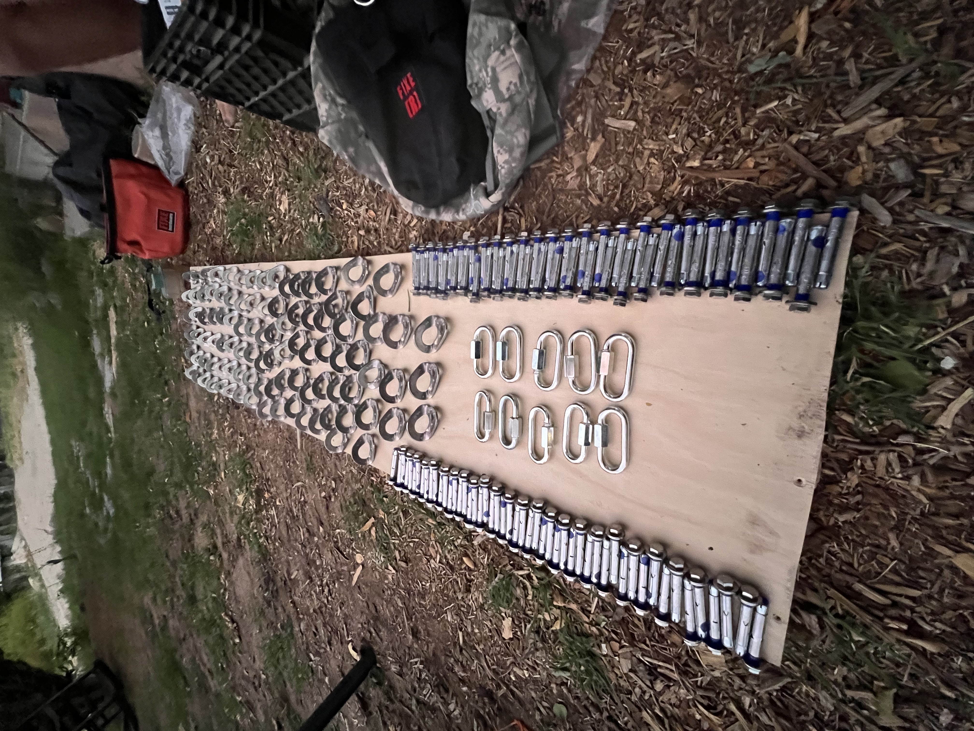 Prepping hardware to be installed on the wall.